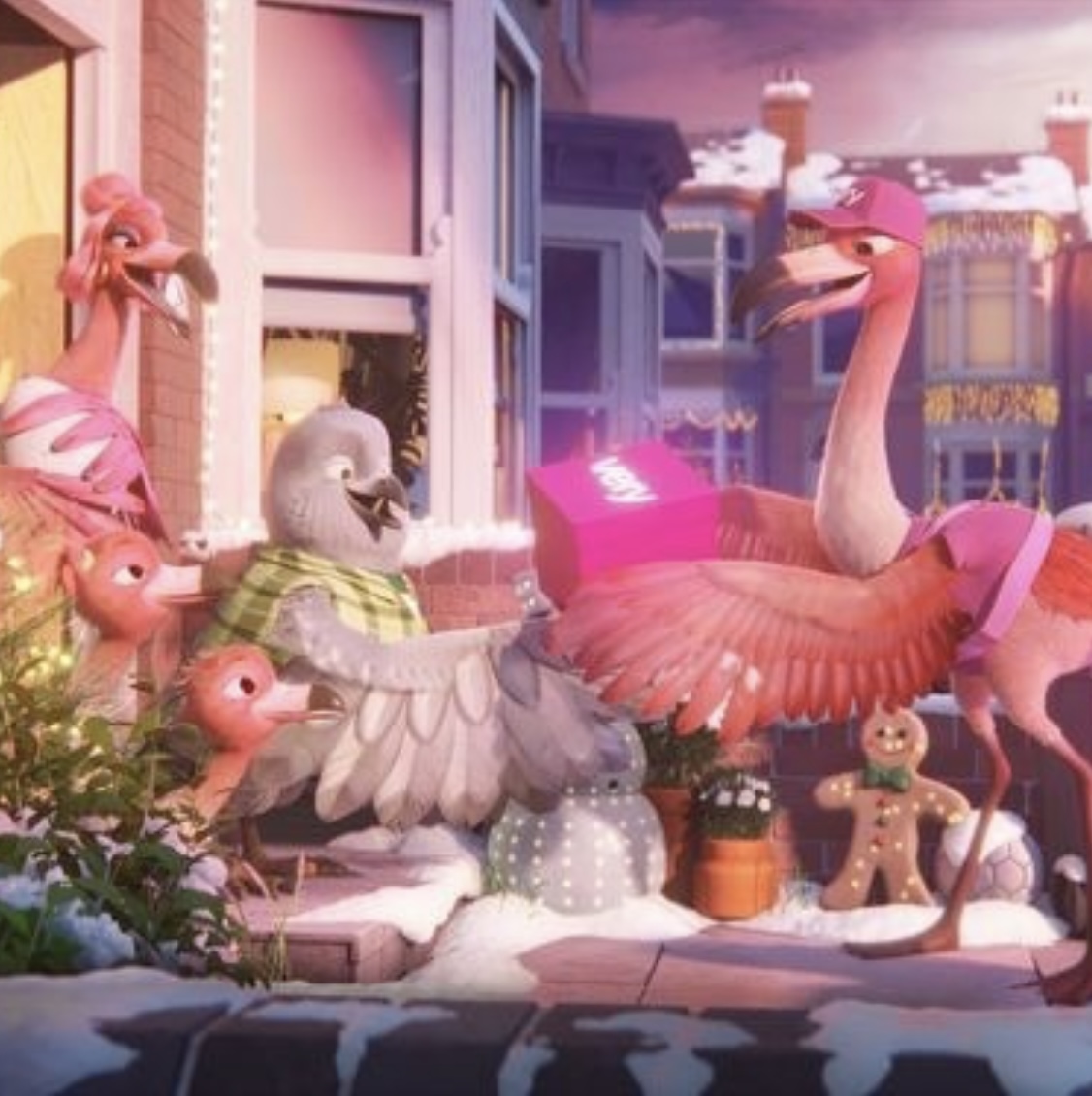 A pink 'Very' flamingo gifting a present to some other birds.